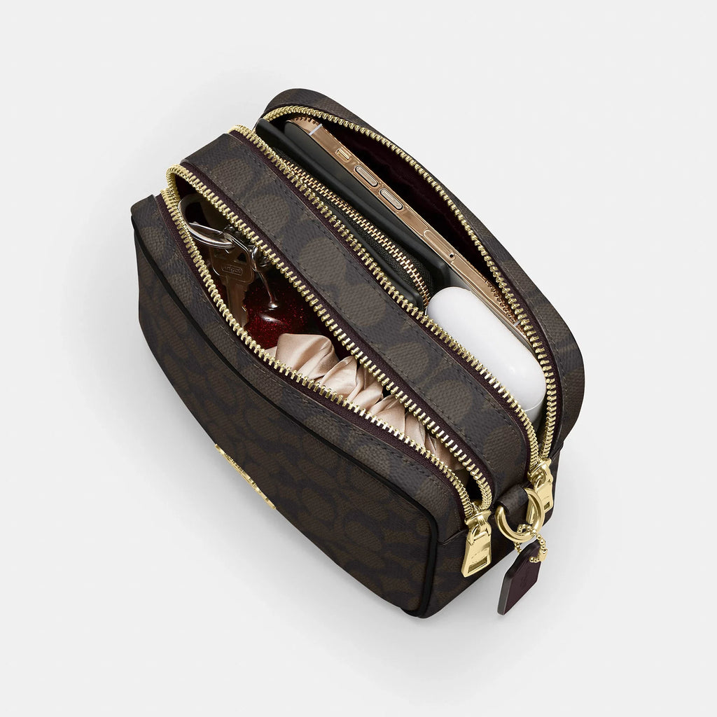 Coach Outlet Mini Carey Crossbody Bag In Signature Canvas