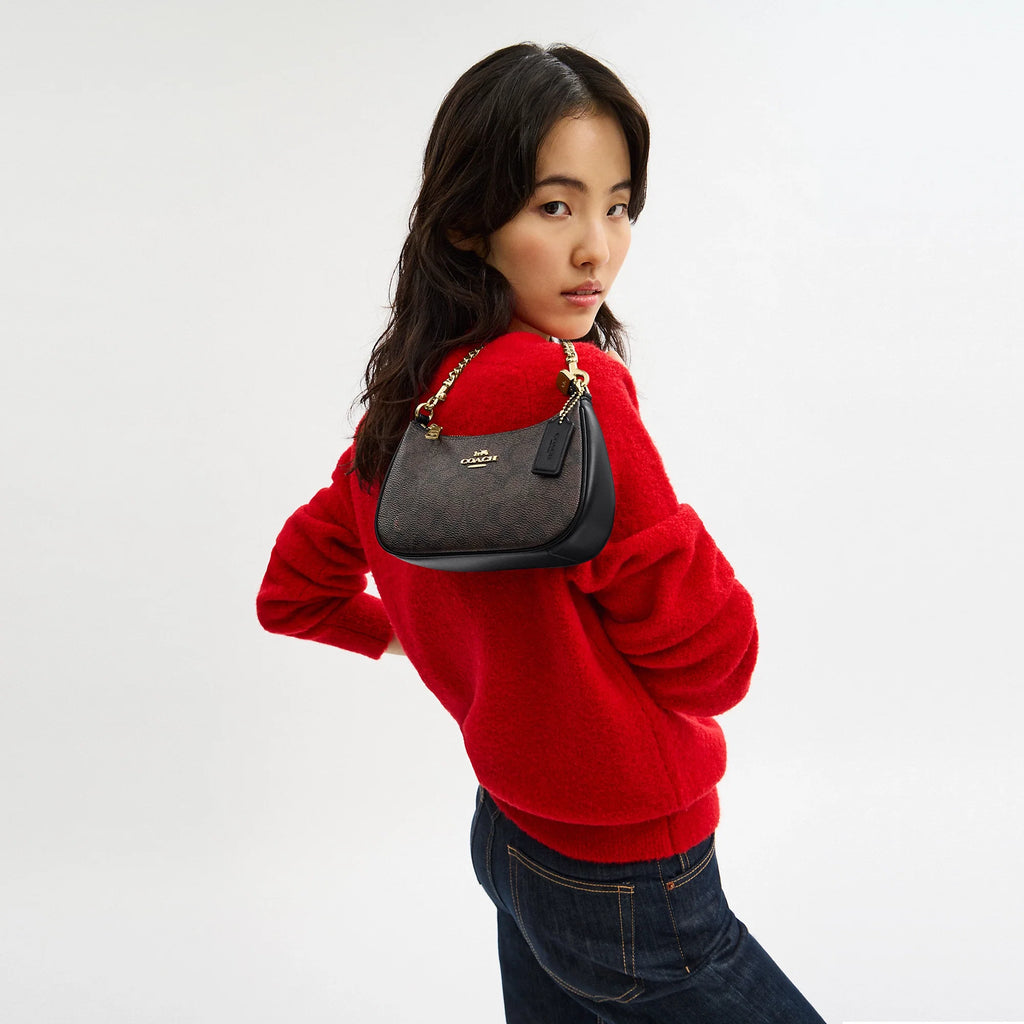 Coach Outlet Teri Mini Crossbody Bag In Signature Canvas