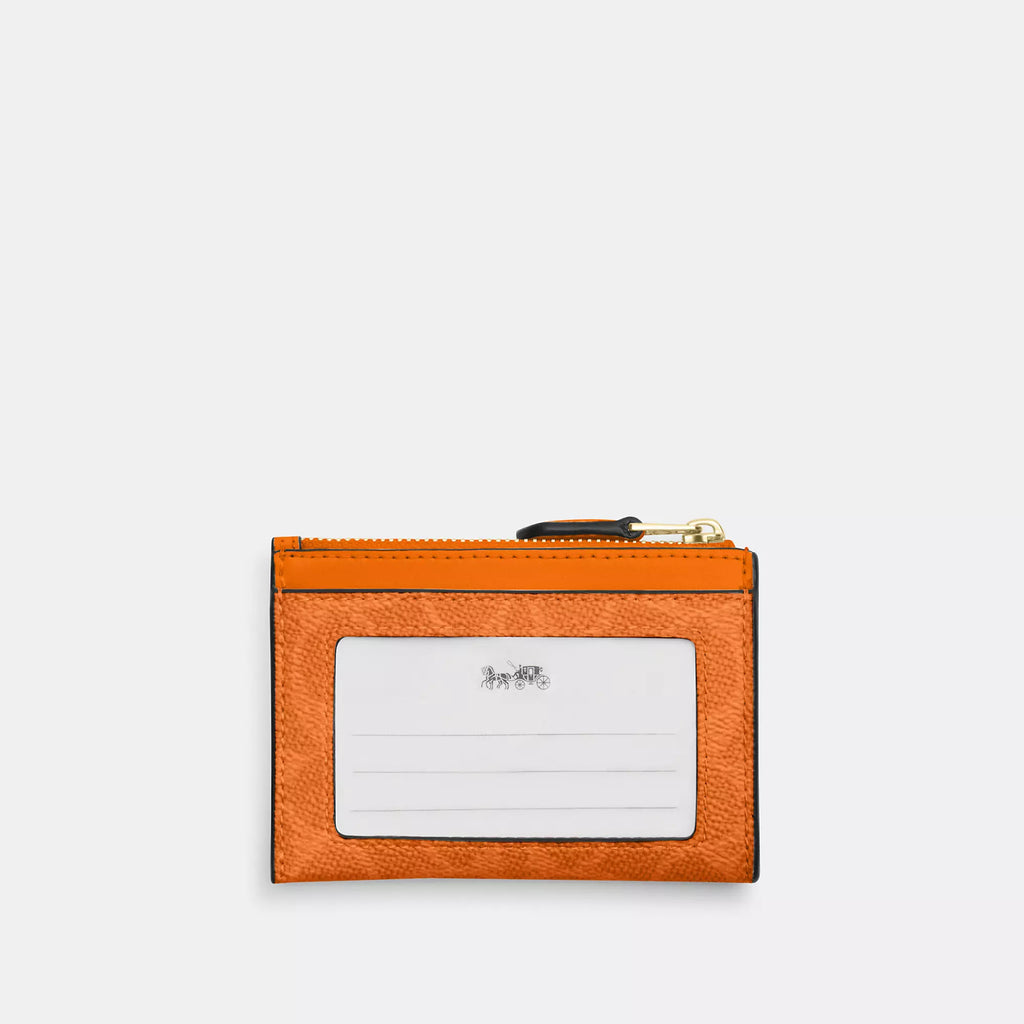 Coach Outlet Mini Skinny Id Case In Signature Canvas