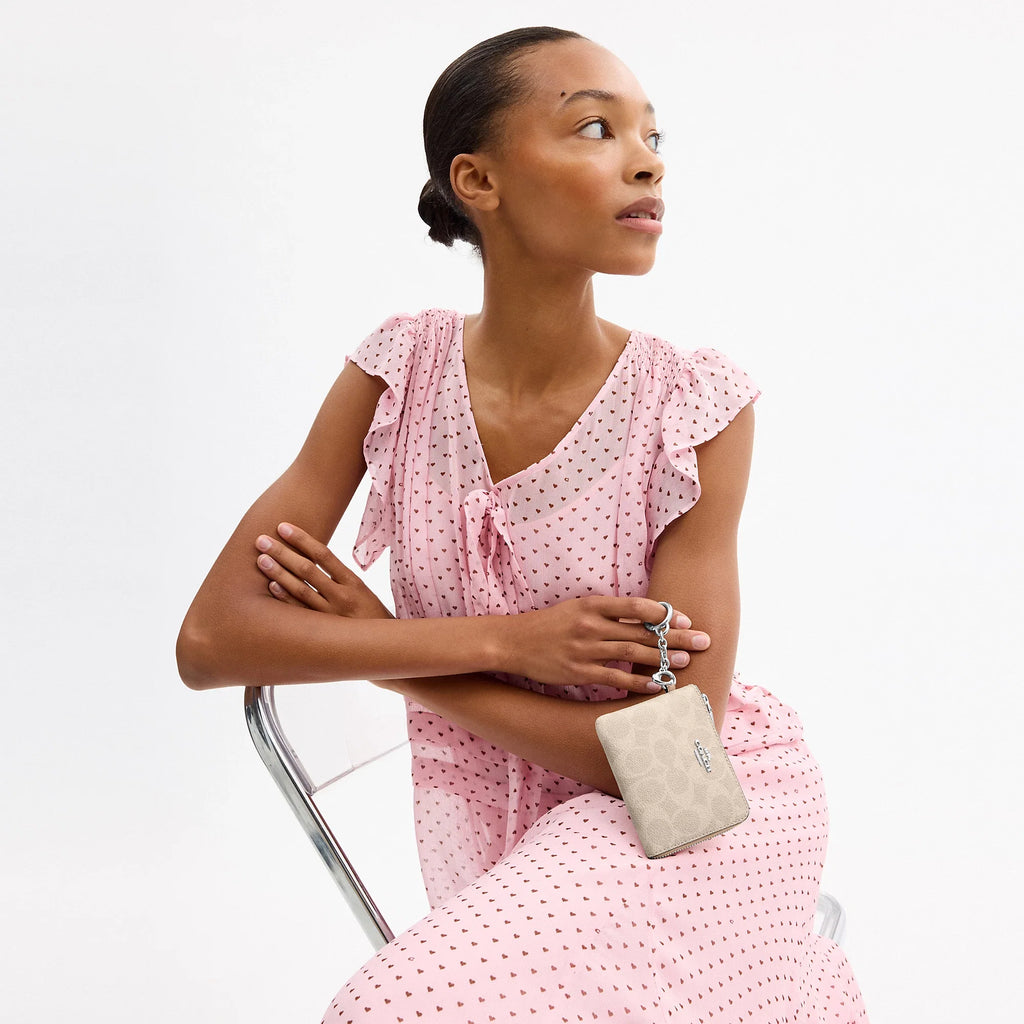 Coach Outlet Small Corner Zip Wallet In Signature Canvas