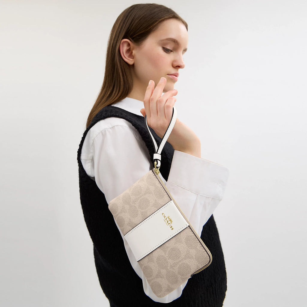 Coach Outlet Corner Zip Wristlet In Signature Canvas With Stripe