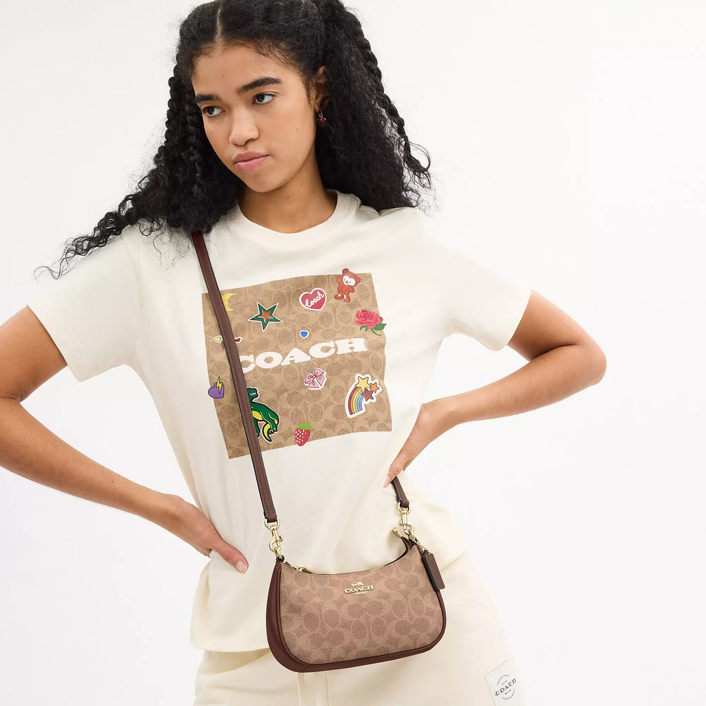 Coach Outlet Teri Mini Crossbody Bag In Signature Canvas