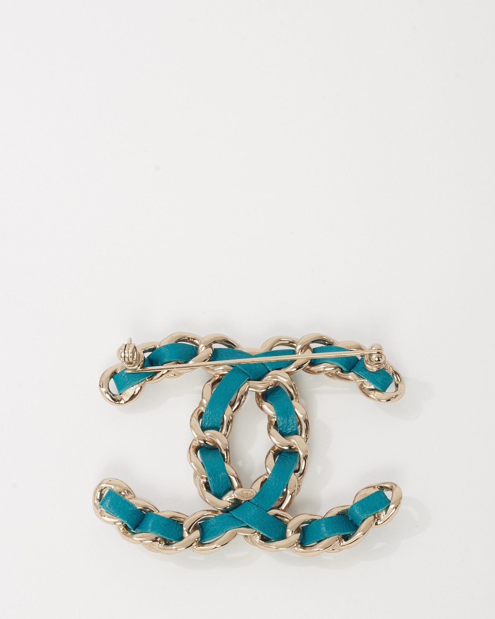Chanel Silver Metal and Turquoise Blue Leather and Pearl Interwoven CC Logo Brooch