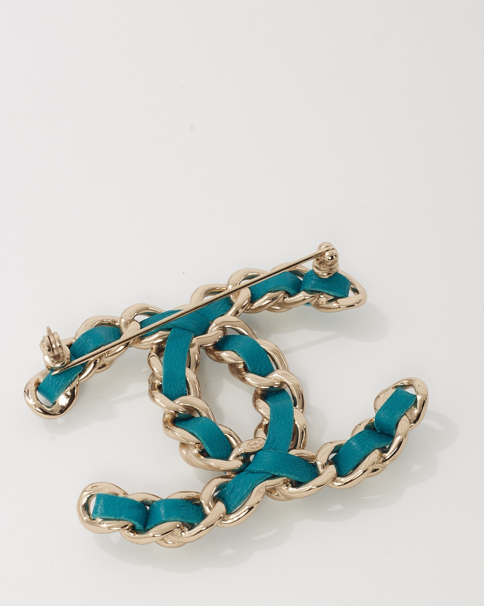 Chanel Silver Metal and Turquoise Blue Leather and Pearl Interwoven CC Logo Brooch
