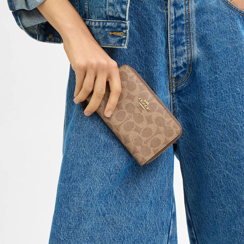 Coach Outlet Medium Id Zip Wallet In Signature Canvas