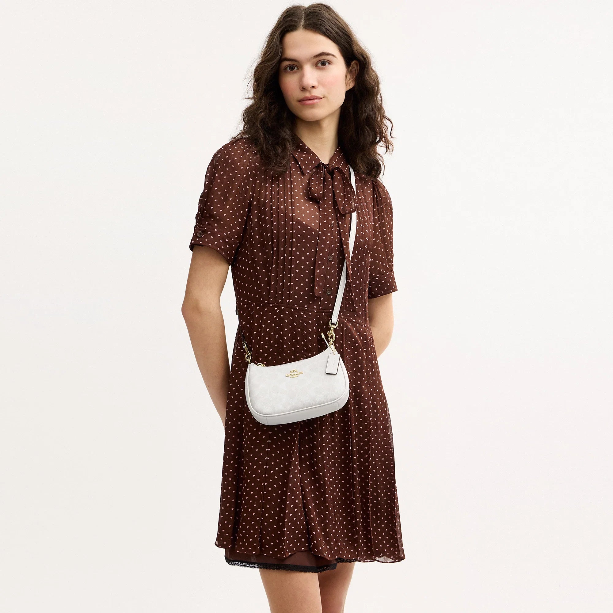 Coach Outlet Teri Mini Crossbody Bag In Signature Canvas